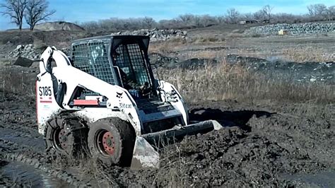 skid steer in muddy conditions|wheel loaders stuck in mud.